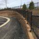 Chain Link Stepped Site Fencing at Buzzuto Oakcrest Conifer