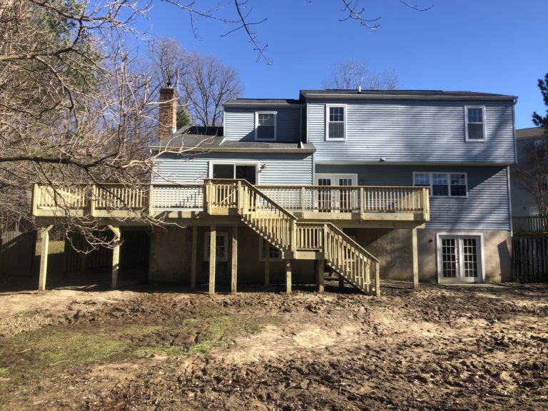 Large Pressure Treated Wood Deck with Wood Railing and Standard Balusters