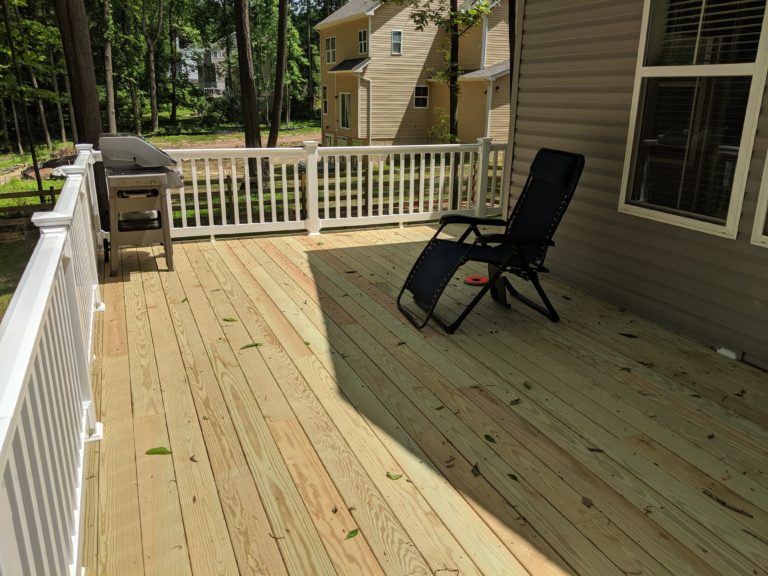 Pressure Treated Deck with White Washington Vinyl Railing