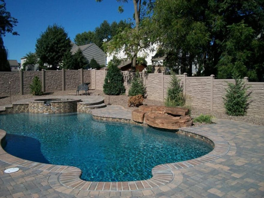 Browne Granite Simtek Fence surrounding pool