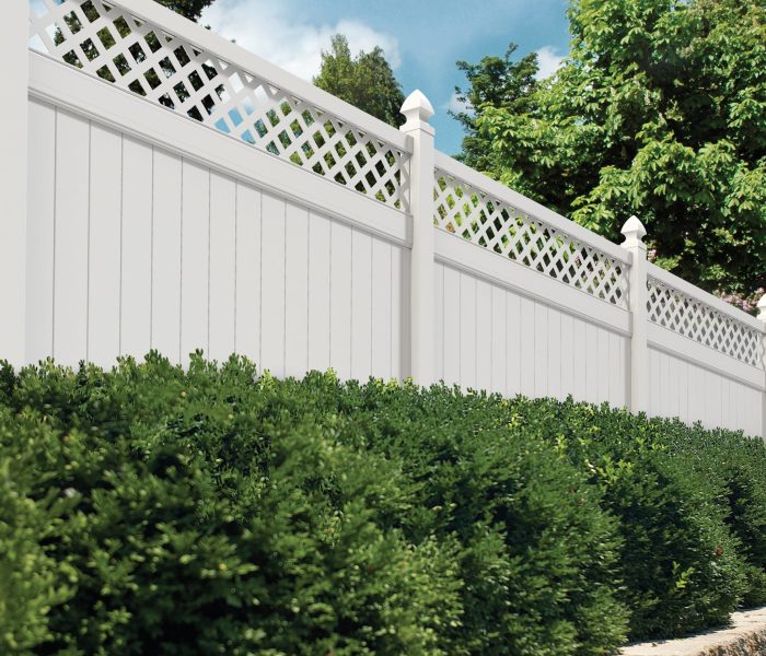 Fence and Deck Connection Fence Installation Services showing a vinyl privacy fence with lattice top-min