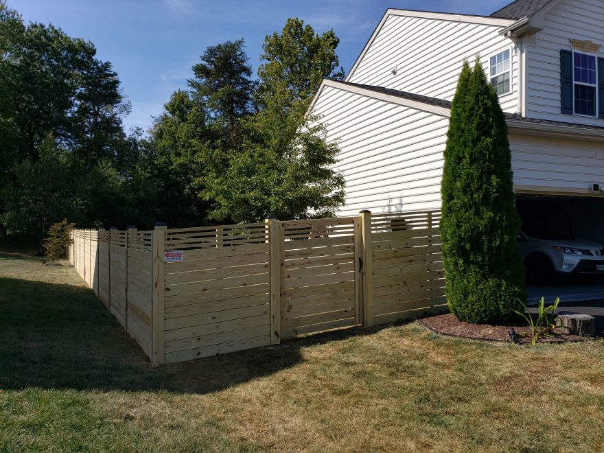 Pressure Treated Spaced Horizontal Fence with 1x6 Boards and matching walk gate